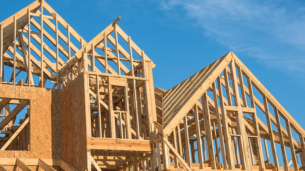 Wooden frame of house under construction