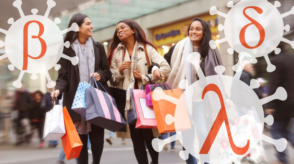 Three women shopping, with Covid-19 germs around them