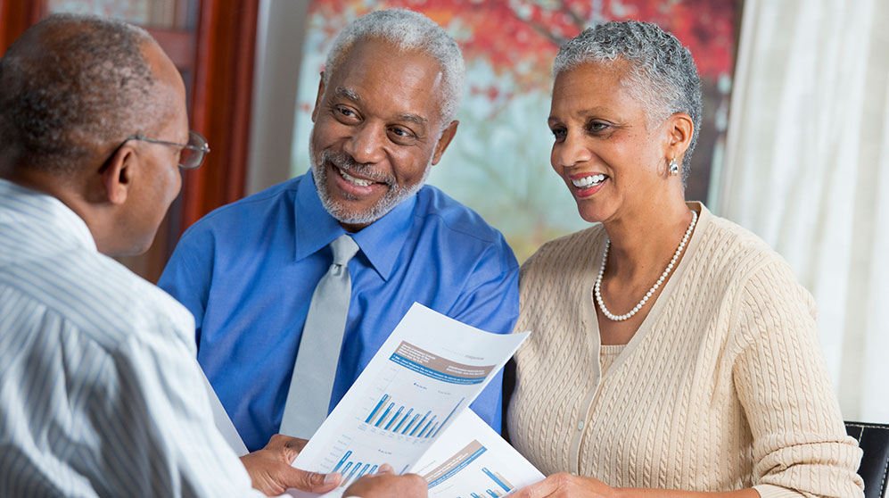 A couple receiving financial advise